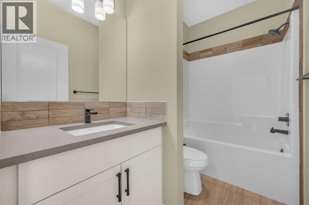 32 Rowmont Common Nw, Calgary, Alberta  T3L 0L3 - Photo 7 - A2233479