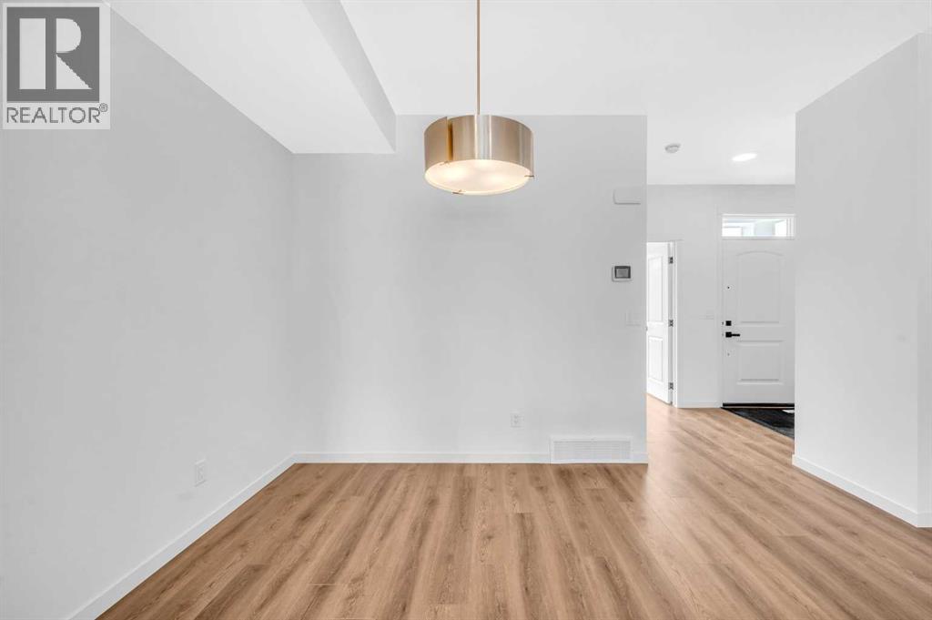 32 Rowmont Common Nw, Calgary, Alberta  T3L 0L3 - Photo 11 - A2233479
