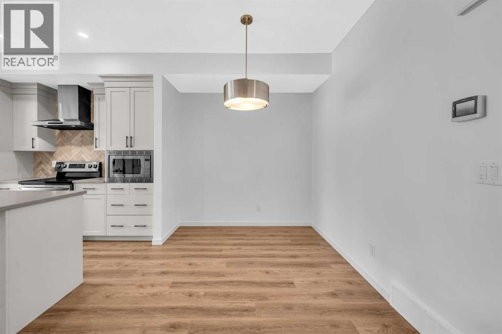 32 Rowmont Common Nw, Calgary, Alberta  T3L 0L3 - Photo 9 - A2233479