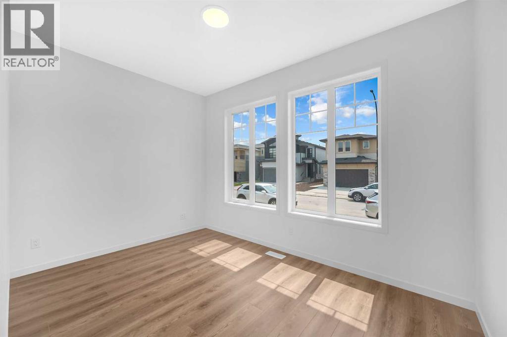 32 Rowmont Common Nw, Calgary, Alberta  T3L 0L3 - Photo 5 - A2233479