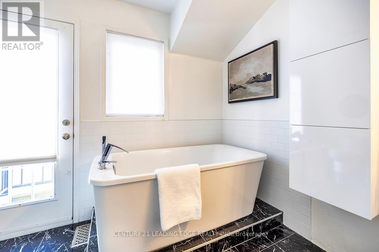 Th57 - 113 The Queensway, Toronto, Ontario  M6S 5B4 - Photo 13 - W12468099