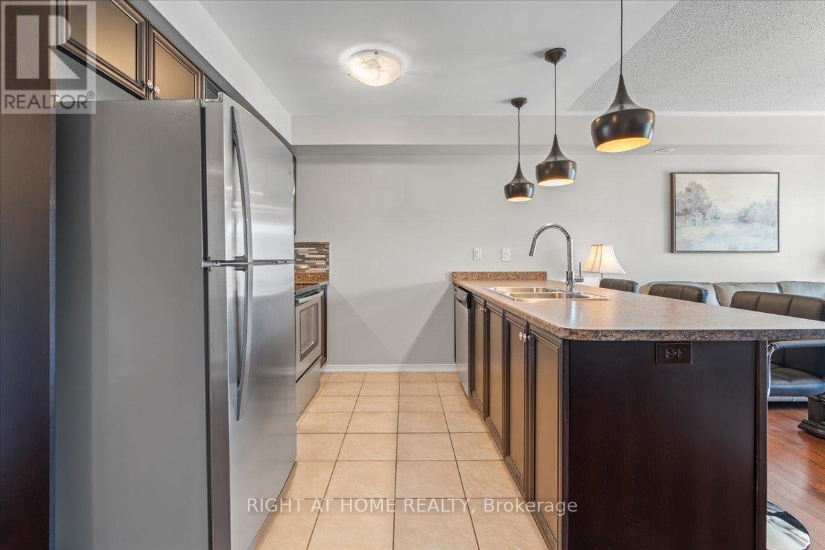 11 - 149 Isaac Devins Boulevard, Toronto, Ontario  M9M 0C5 - Photo 4 - W12468114