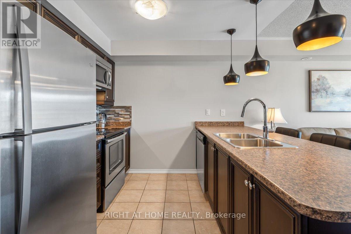 11 - 149 Isaac Devins Boulevard, Toronto, Ontario  M9M 0C5 - Photo 5 - W12468114