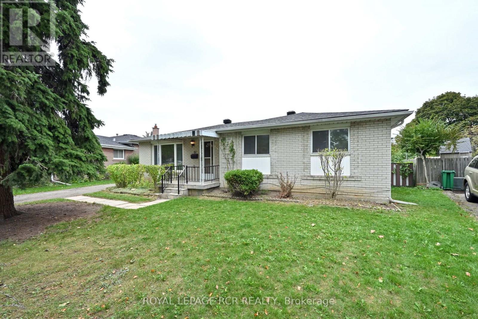 61 Belmont Drive, Brampton, Ontario  L6T 2K5 - Photo 1 - W12468350
