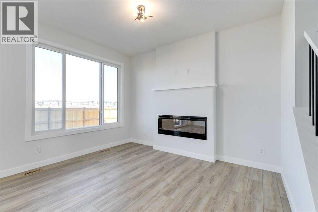 607 Buffaloberry Manor Se, Calgary, Alberta  T3M 3Z2 - Photo 7 - A2254304