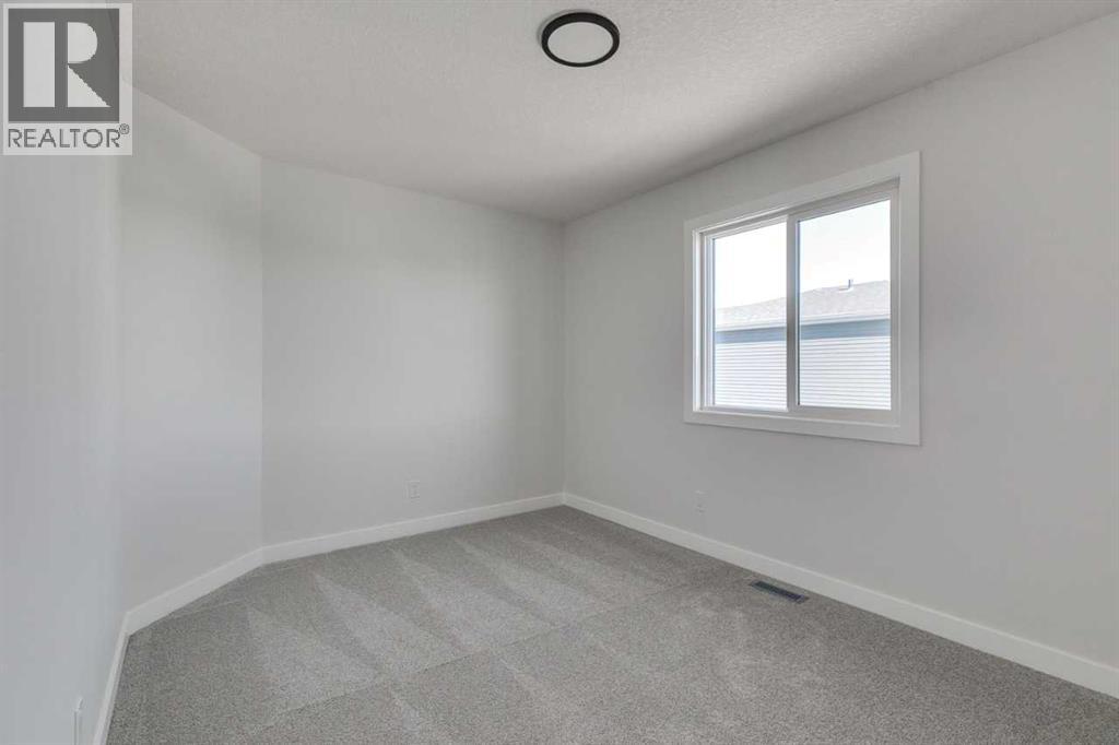607 Buffaloberry Manor Se, Calgary, Alberta  T3M 3Z2 - Photo 20 - A2254304