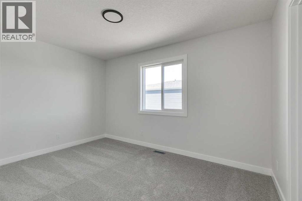 607 Buffaloberry Manor Se, Calgary, Alberta  T3M 3Z2 - Photo 19 - A2254304