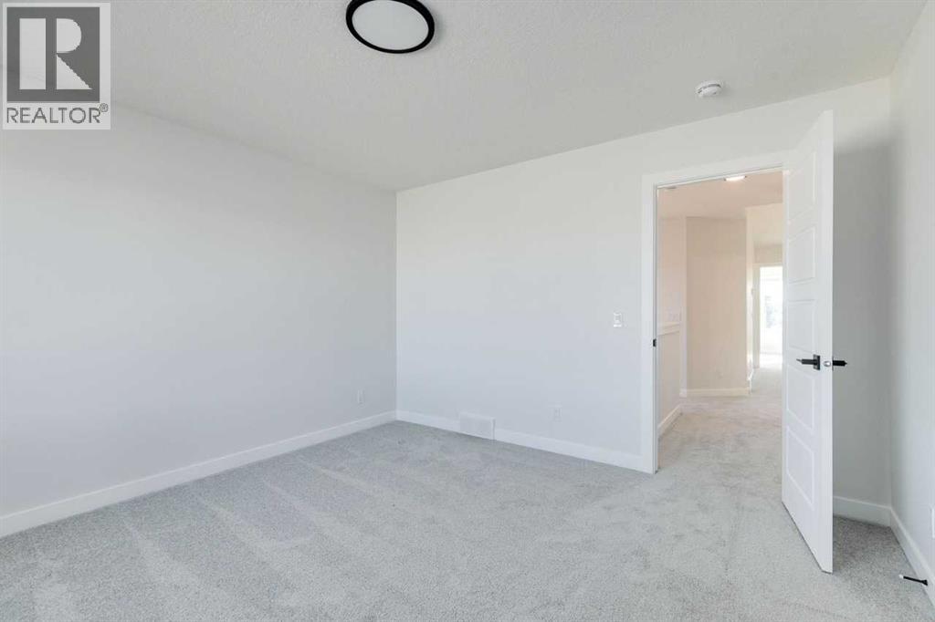 607 Buffaloberry Manor Se, Calgary, Alberta  T3M 3Z2 - Photo 25 - A2254304
