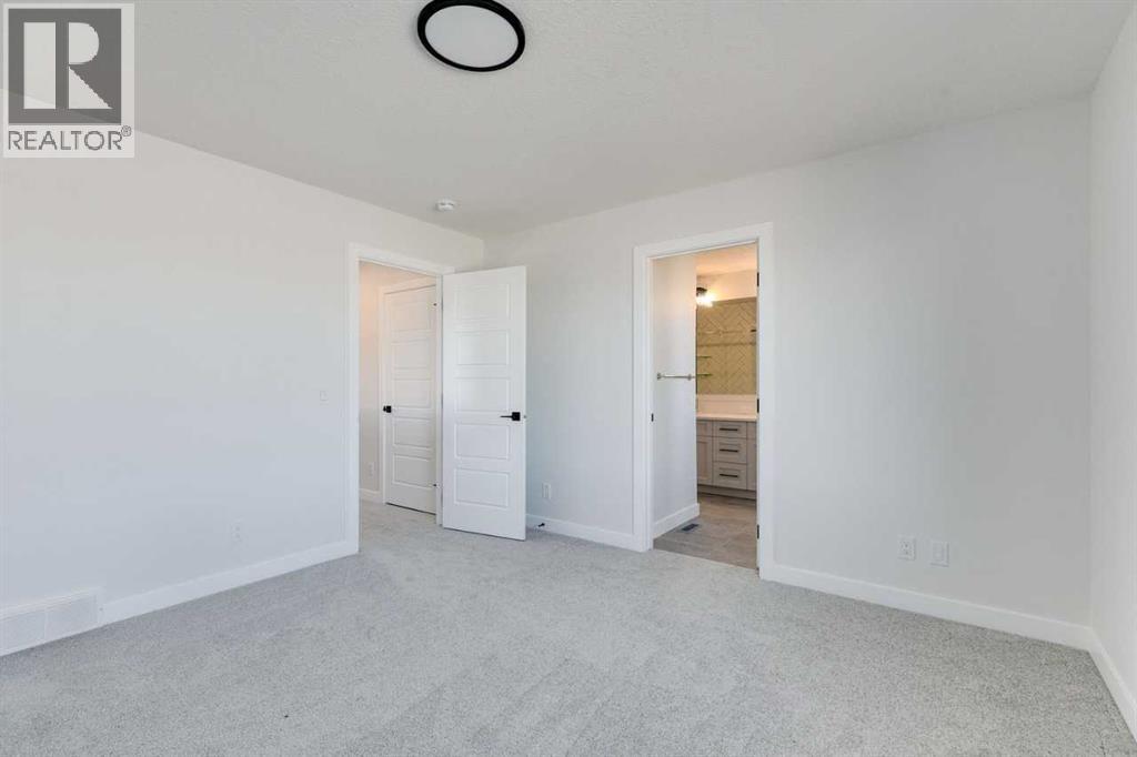 607 Buffaloberry Manor Se, Calgary, Alberta  T3M 3Z2 - Photo 26 - A2254304