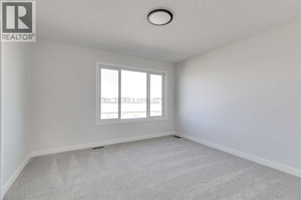 607 Buffaloberry Manor Se, Calgary, Alberta  T3M 3Z2 - Photo 24 - A2254304