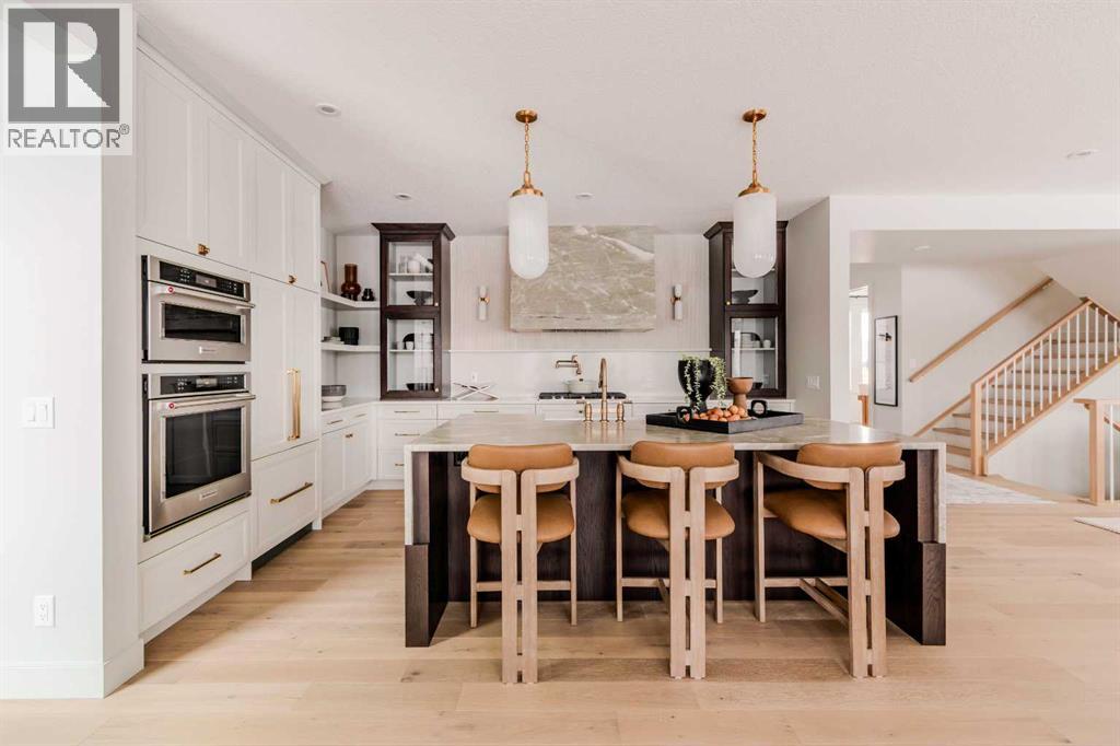 229 Rowmont Drive Nw, Calgary, Alberta  T3L 0J3 - Photo 4 - A2248715