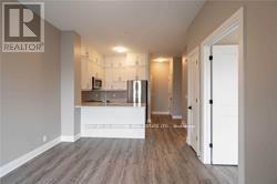 624 - 102 Grovewood Commons Crescent, Oakville, Ontario  L6H 0X2 - Photo 5 - W12468298