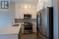 624 - 102 Grovewood Commons Crescent, Oakville, Ontario  L6H 0X2 - Photo 7 - W12468298