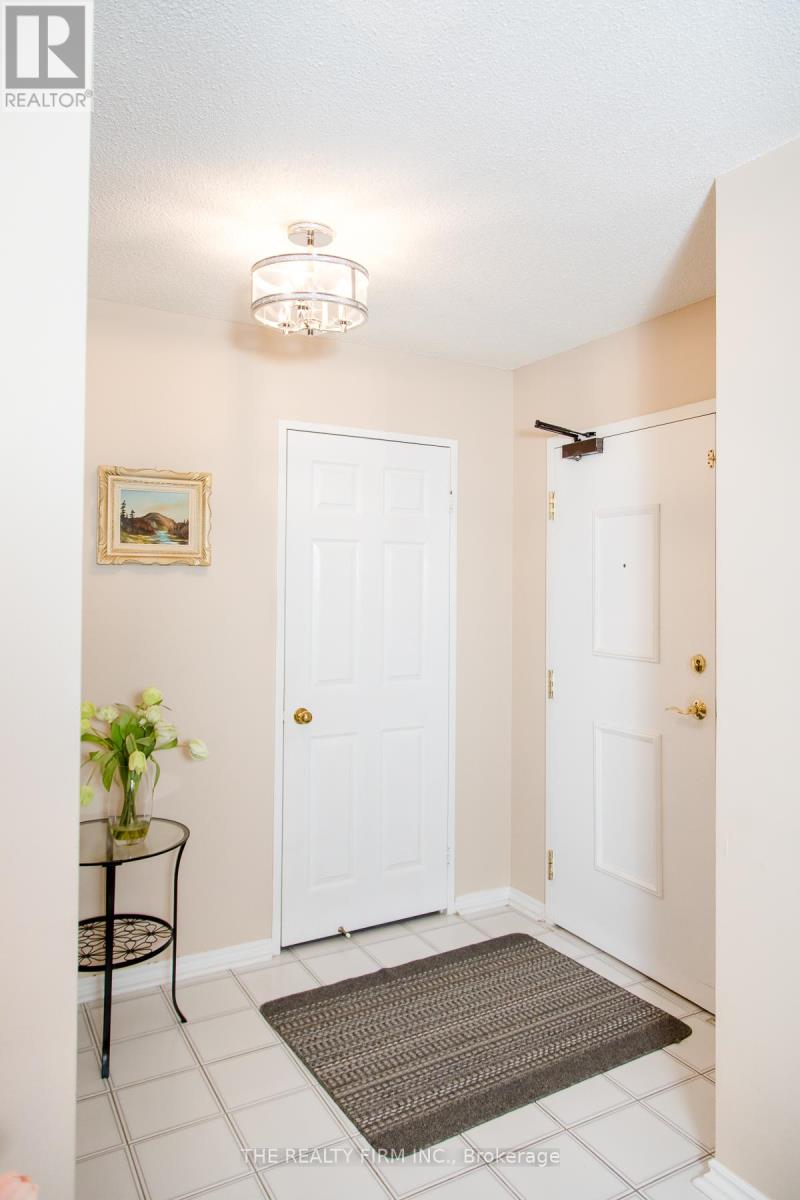 406 - 100 County Court Boulevard, Brampton, Ontario  L6W 3X1 - Photo 7 - W12469063