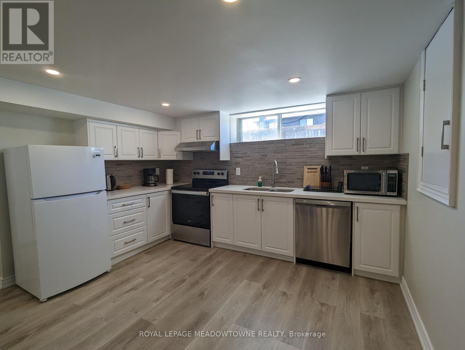 240 Wellesworth Drive, Toronto, Ontario  M9C 4S6 - Photo 4 - W12468869
