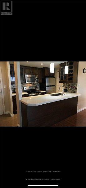 621 - 1001 Cedarglen Gate, Mississauga, Ontario  L5C 4R2 - Photo 7 - W12469016