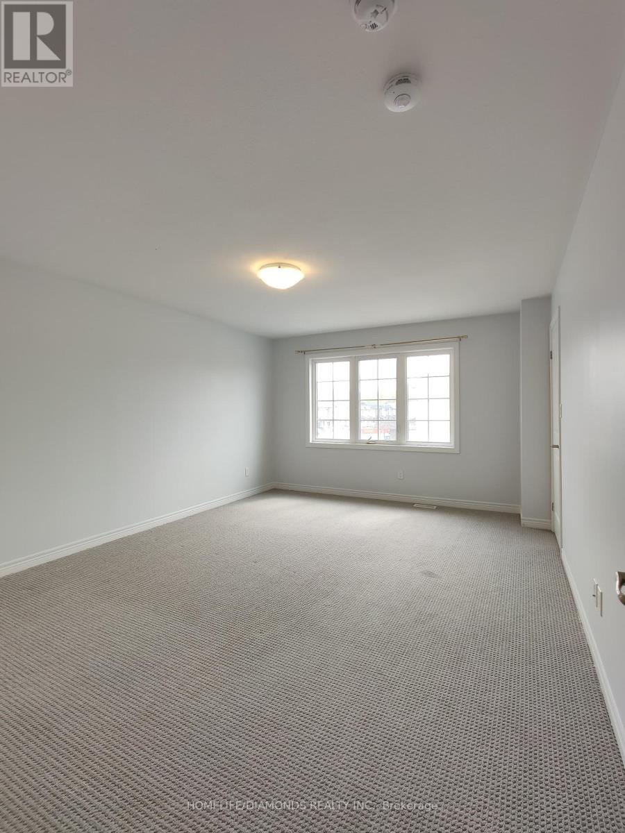 95 Bur Oak Drive, Thorold, Ontario  L2V 0L8 - Photo 5 - X12469020