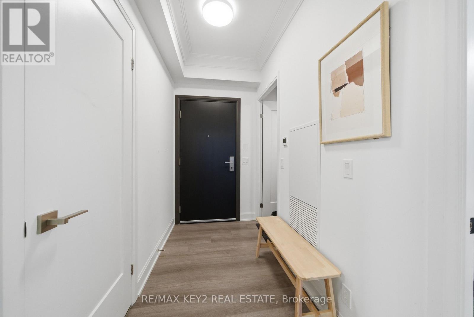 601 - 38 Water Walk Drive, Markham, Ontario  L3R 6M8 - Photo 4 - N12469115