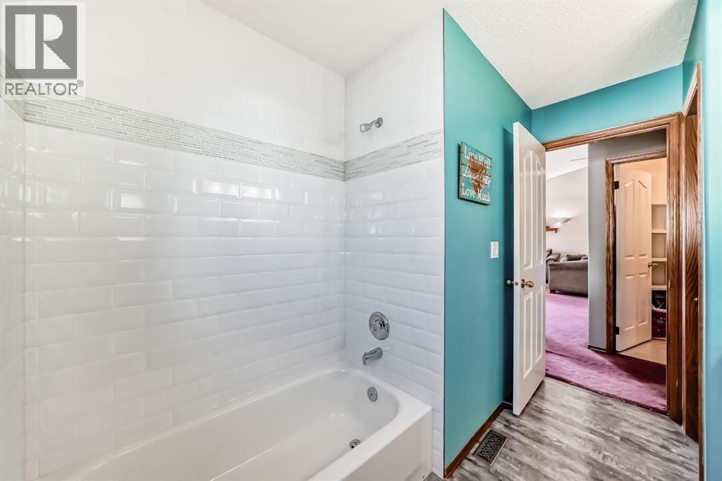 152 Quigley Drive, Cochrane, Alberta  T4C 1R2 - Photo 23 - A2264522