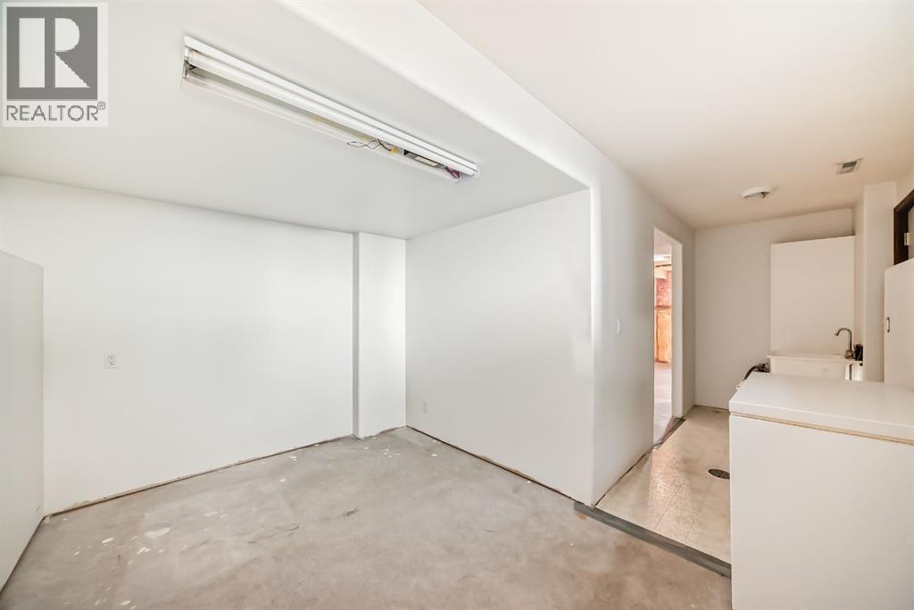 152 Quigley Drive, Cochrane, Alberta  T4C 1R2 - Photo 34 - A2264522