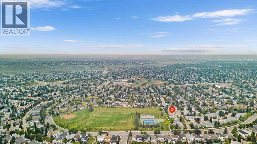 83 Macewan Park Heights Nw, Calgary, Alberta  T3K 3W6 - Photo 3 - A2255899