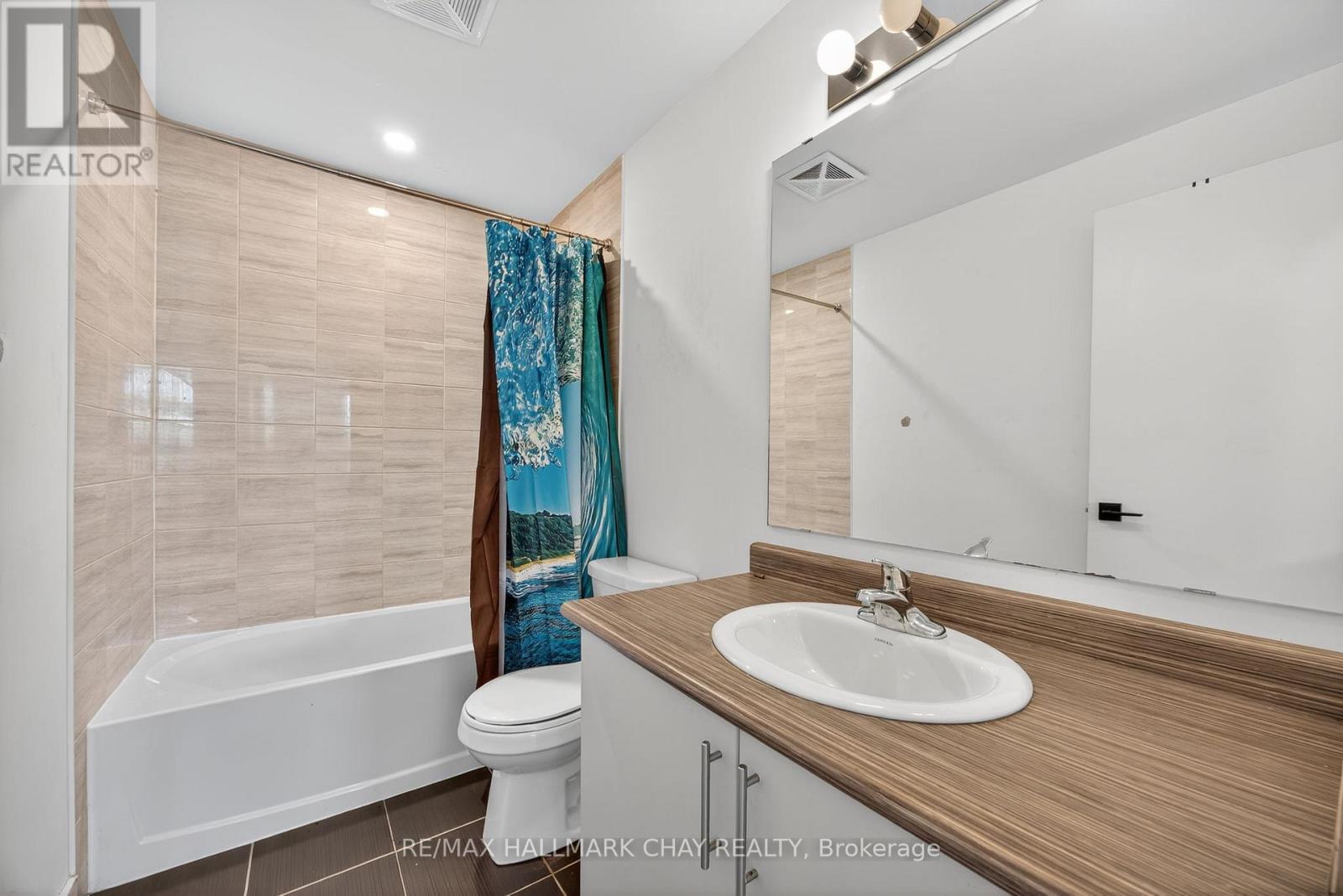 104 - 6 Spice Way, Barrie, Ontario  L9J 0J9 - Photo 10 - S12469214
