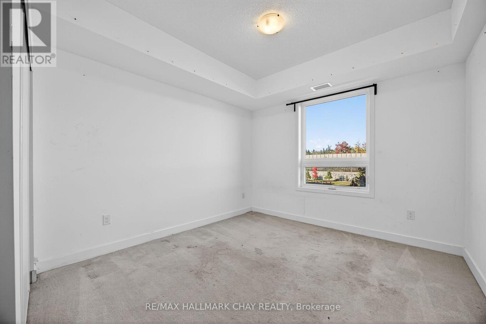 104 - 6 Spice Way, Barrie, Ontario  L9J 0J9 - Photo 8 - S12469214