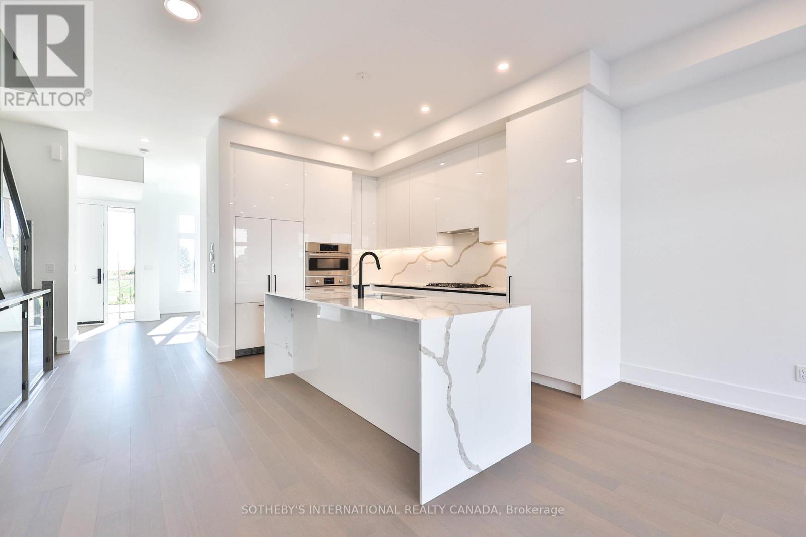 Th 85 - 60 Lou Parsons Way Drive, Mississauga, Ontario  L5H 0B2 - Photo 4 - W12469261