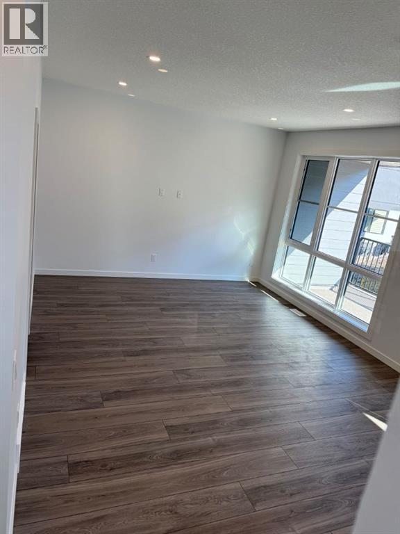 104, 1453 Na'a Drive Sw, Calgary, Alberta  T3H 6H7 - Photo 22 - A2250709