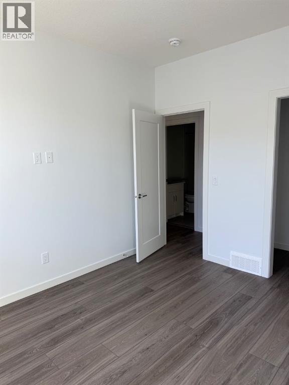 104, 1453 Na'a Drive Sw, Calgary, Alberta  T3H 6H7 - Photo 31 - A2250709