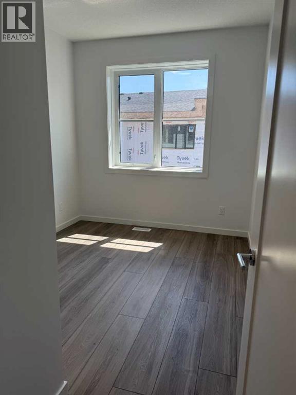 104, 1453 Na'a Drive Sw, Calgary, Alberta  T3H 6H7 - Photo 2 - A2250709