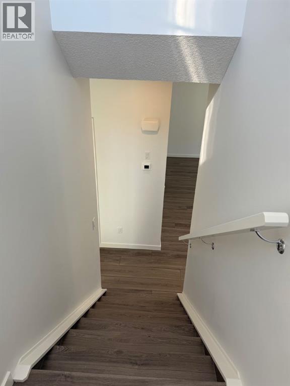 104, 1453 Na'a Drive Sw, Calgary, Alberta  T3H 6H7 - Photo 23 - A2250709