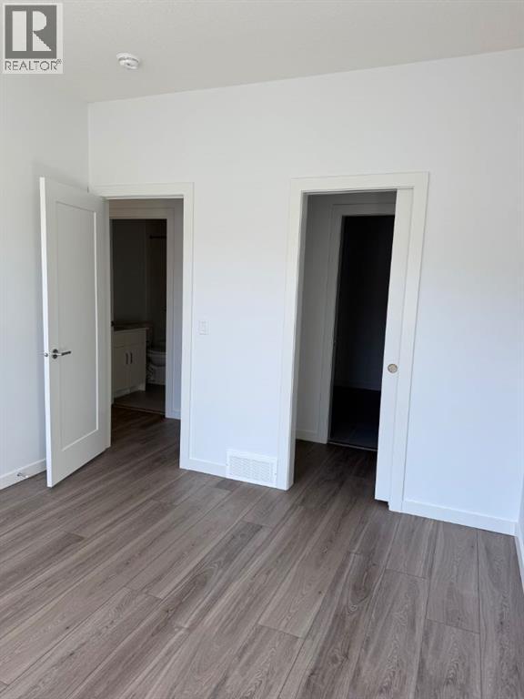 104, 1453 Na'a Drive Sw, Calgary, Alberta  T3H 6H7 - Photo 32 - A2250709