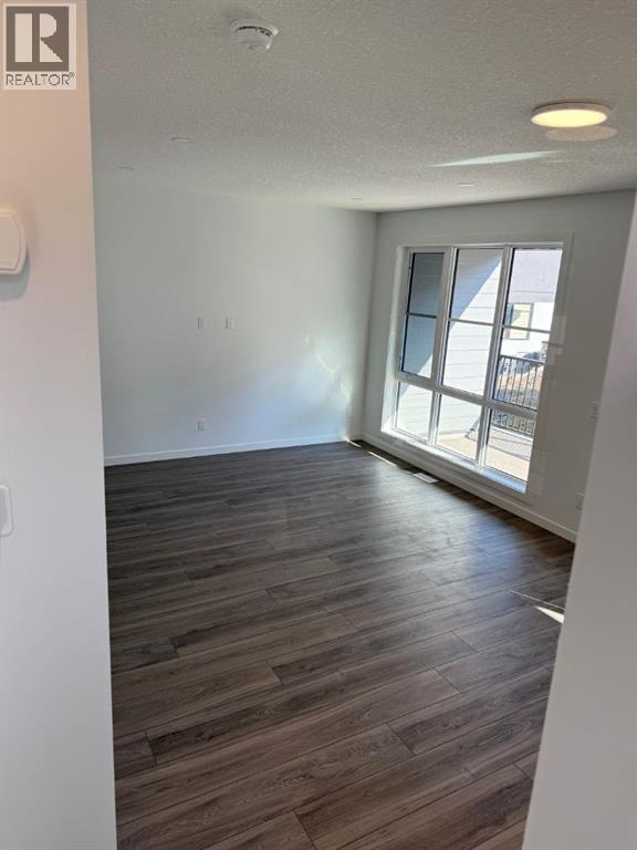 104, 1453 Na'a Drive Sw, Calgary, Alberta  T3H 6H7 - Photo 21 - A2250709