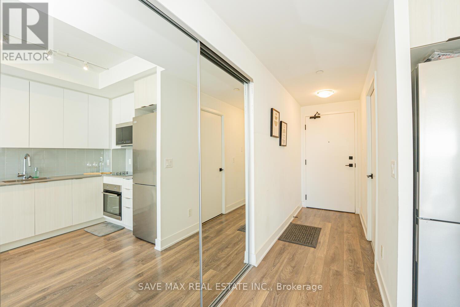 1310 - 2481 Taunton Road, Oakville, Ontario  L6H 3R7 - Photo 6 - W12469606