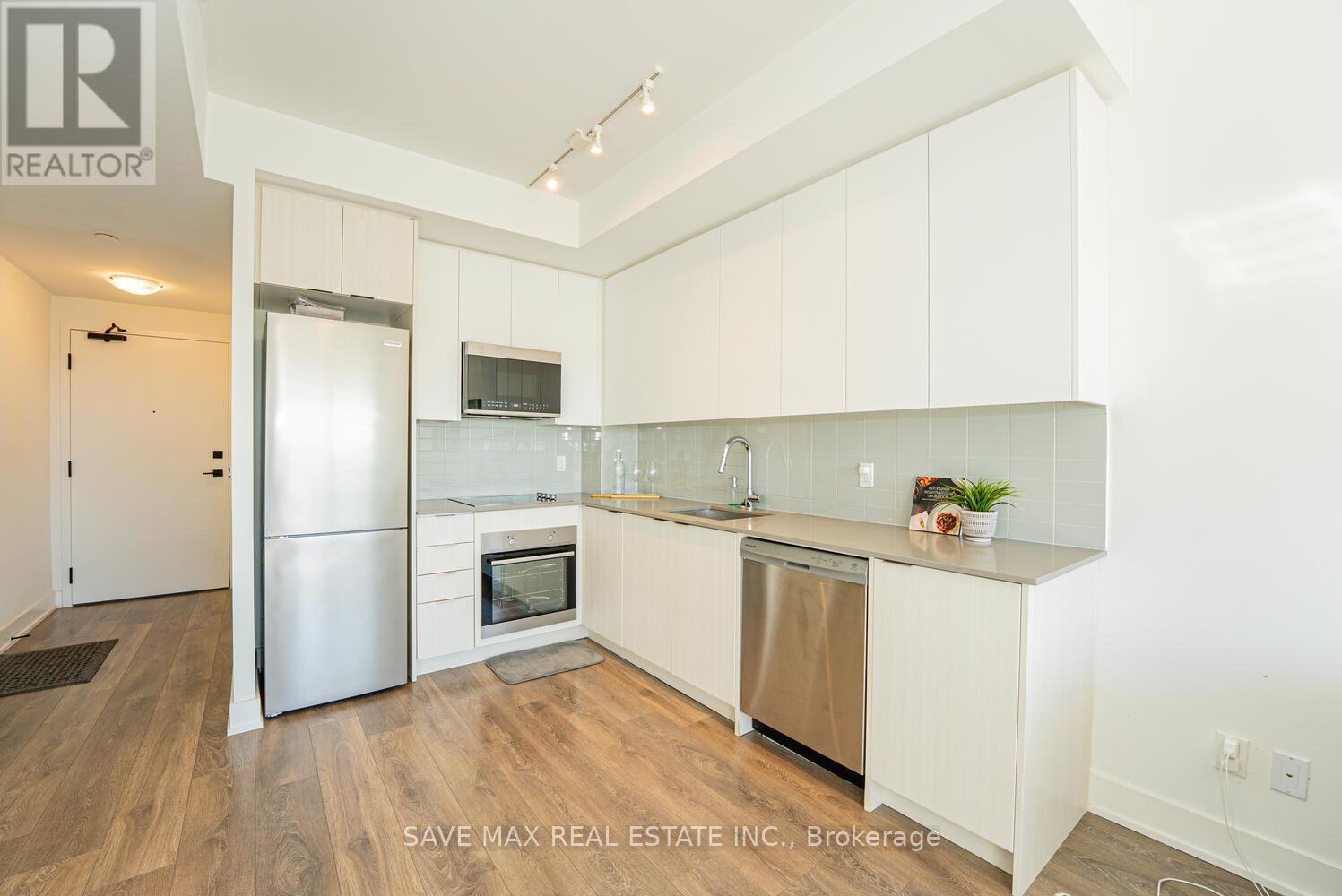 1310 - 2481 Taunton Road, Oakville, Ontario  L6H 3R7 - Photo 8 - W12469606
