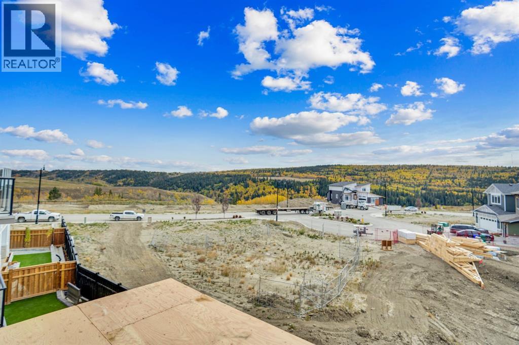 75 Sunvalley Way, Cochrane, Alberta  T4C 0X8 - Photo 30 - A2263493