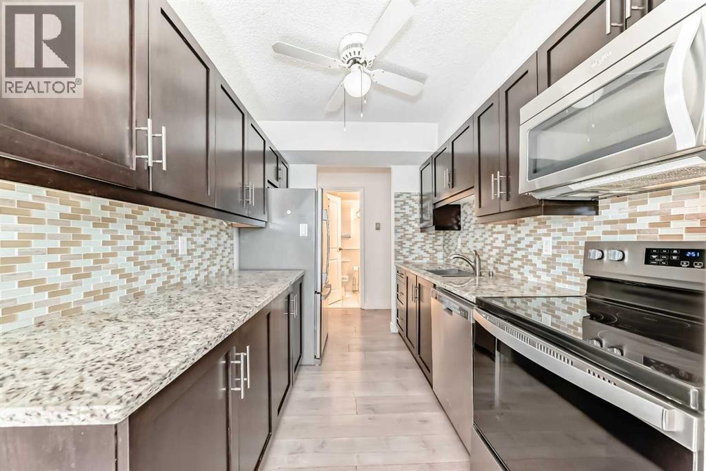 102, 9800 Horton Road Sw, Calgary, Alberta  T2V 5B5 - Photo 1 - A2259298