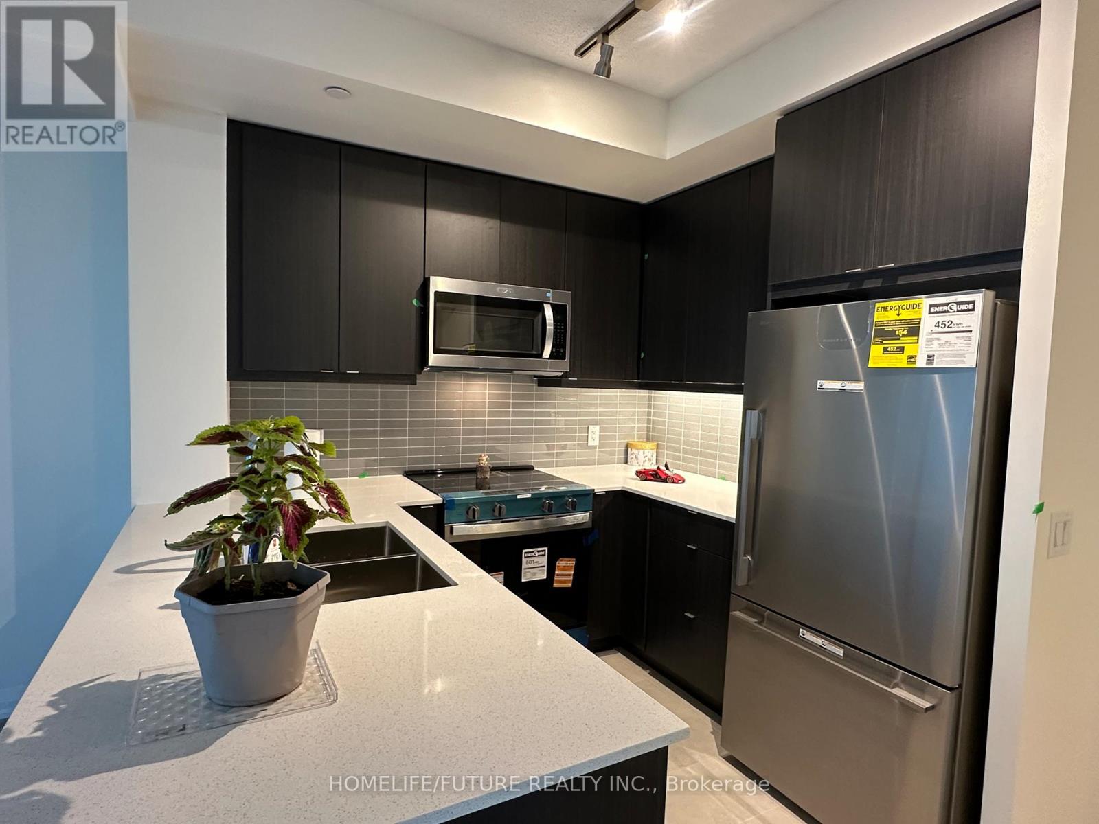 1306 - 3260 Sheppard Avenue E, Toronto, Ontario  M1T 3K3 - Photo 4 - E12469694