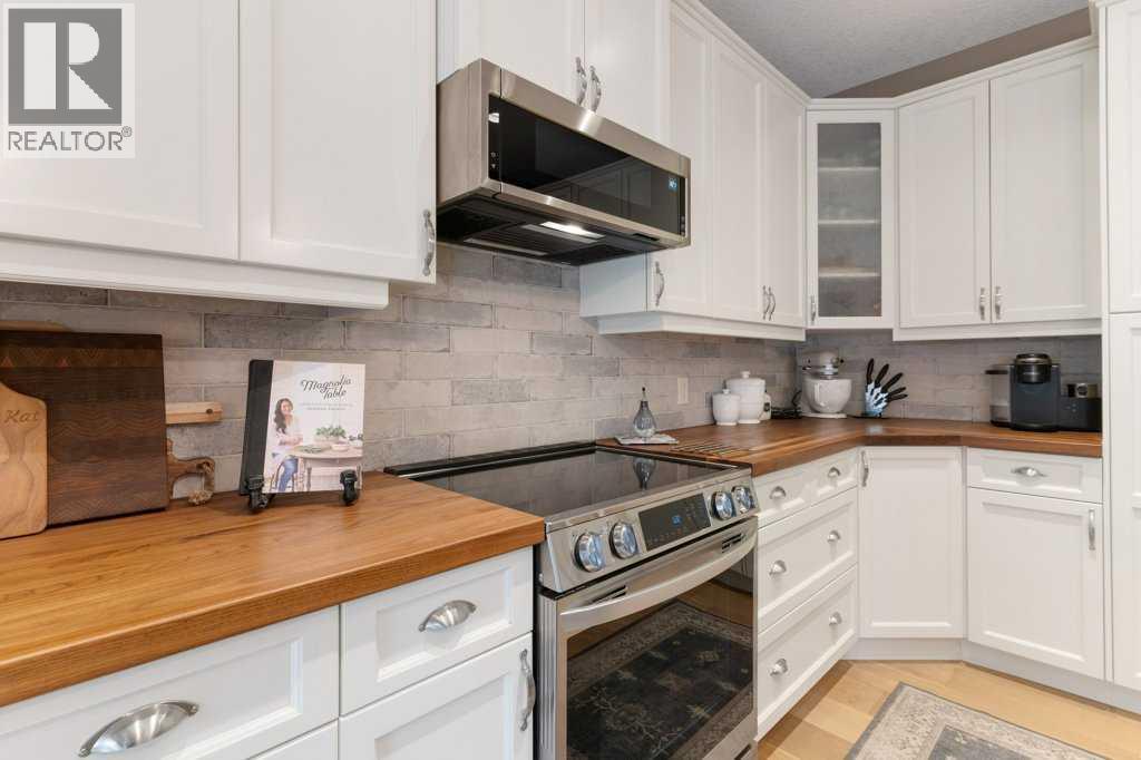 84 Panatella Manor Nw, Calgary, Alberta  T3K 0A7 - Photo 13 - A2261159