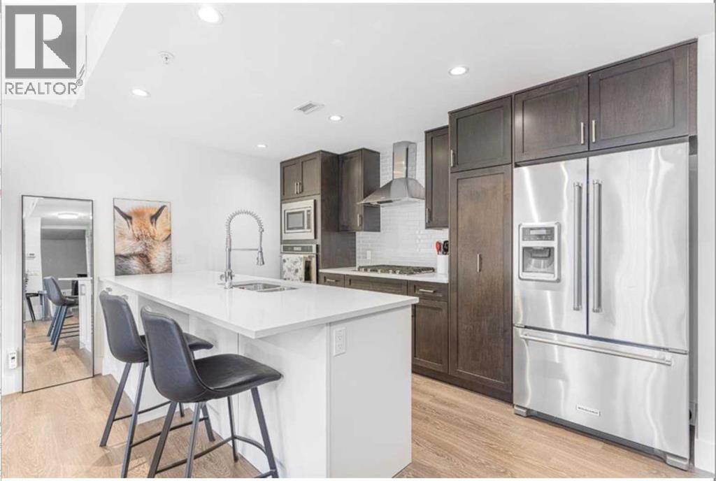 106, 3320 3 Avenue Nw, Calgary, Alberta  T2N 0L9 - Photo 1 - A2262275