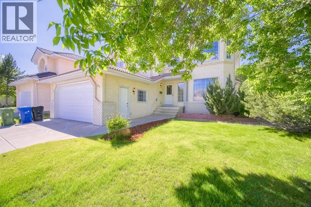 47 Hampshire Grove Nw, Calgary, Alberta  T2W 5Y2 - Photo 2 - A2264514