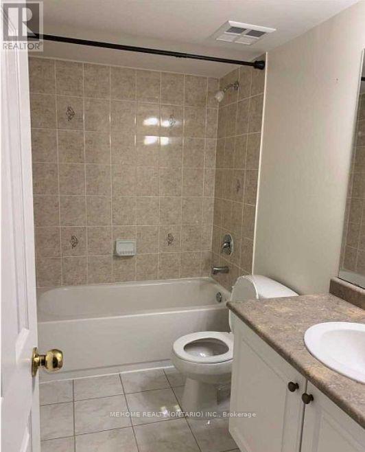 108 Louisbourg Way, Markham, Ontario  L6E 0C5 - Photo 4 - N12469827