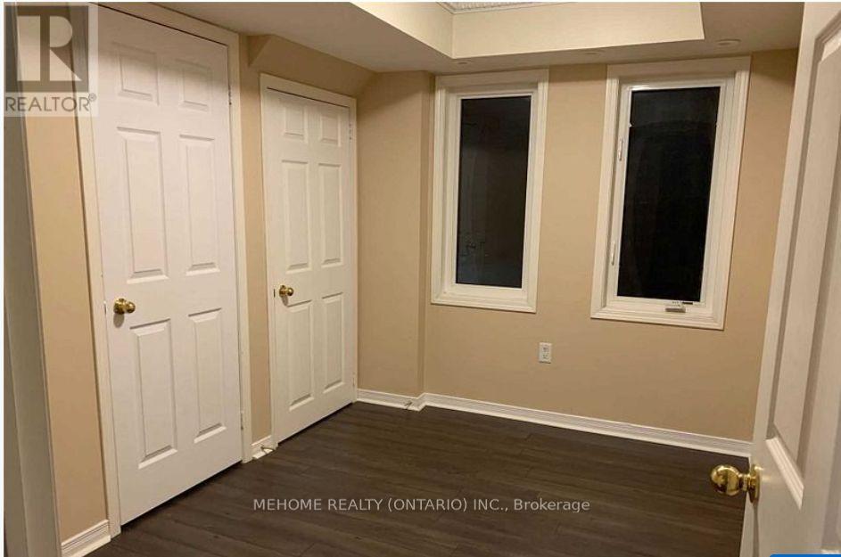 108 Louisbourg Way, Markham, Ontario  L6E 0C5 - Photo 6 - N12469827