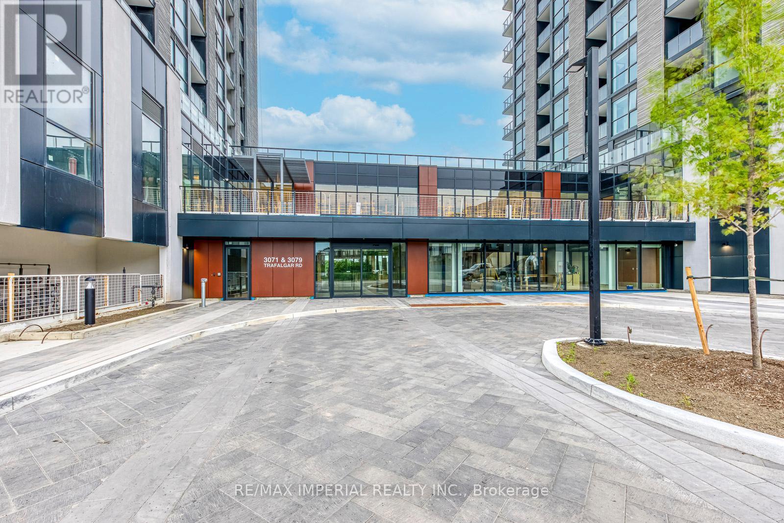 A1410 - 3079 Trafalgar Road, Oakville, Ontario  L6H 8C5 - Photo 2 - W12469877