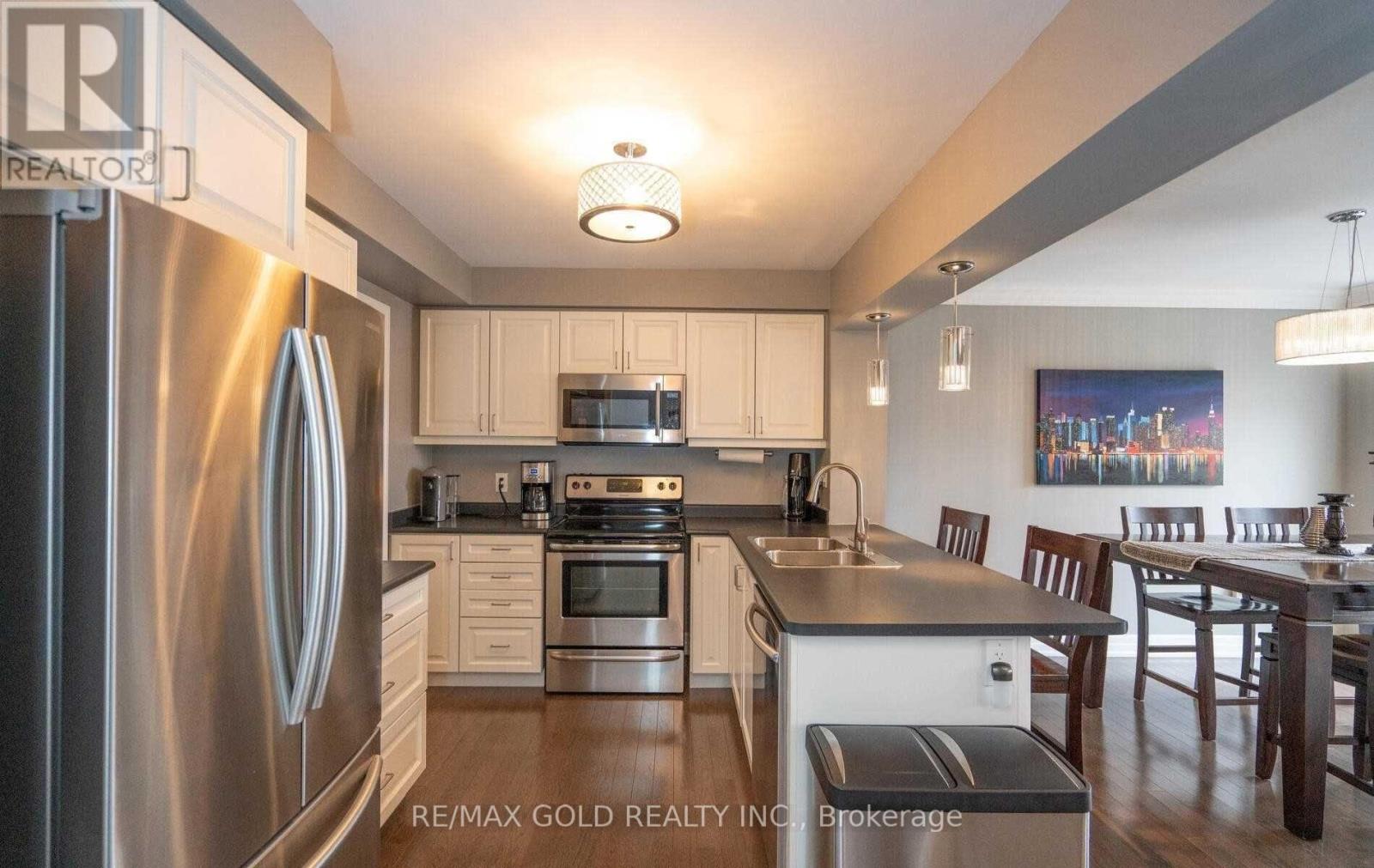 49 Ganton Heights, Brampton, Ontario  L7A 3Y8 - Photo 2 - W12469935