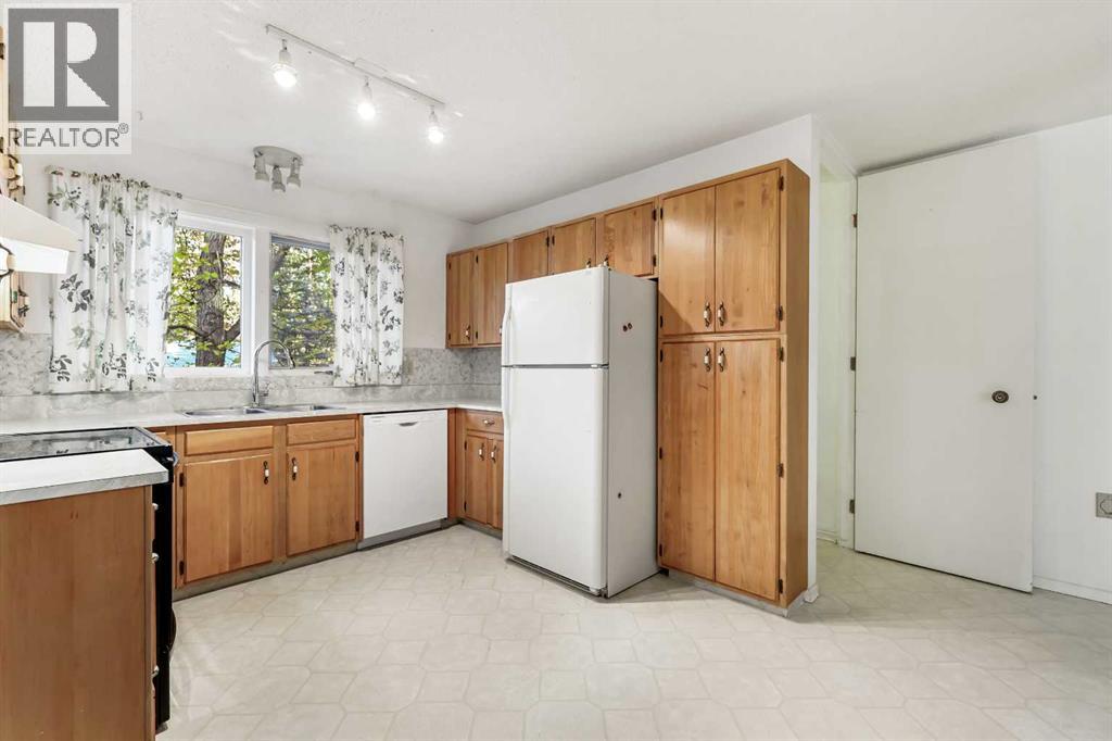 2416 Palliser Drive Sw, Calgary, Alberta  T2V 3S7 - Photo 11 - A2265175