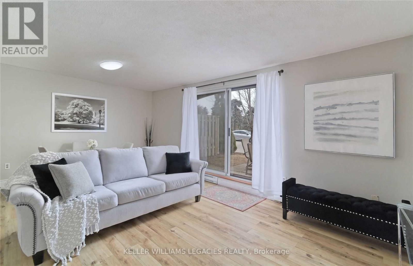 41 - 1016 Falgarwood Drive, Oakville, Ontario  L6H 2P5 - Photo 2 - W12470162