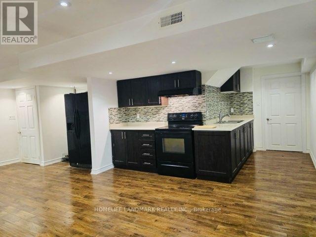 211 Zokol Drive, Aurora, Ontario  L4G 0B8 - Photo 4 - N12470206