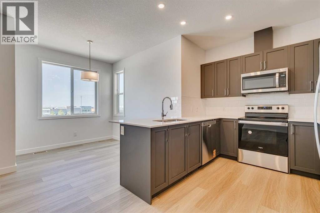406, 65 Belvedere Pointe Se, Calgary, Alberta  T2A 7Y1 - Photo 8 - A2230611